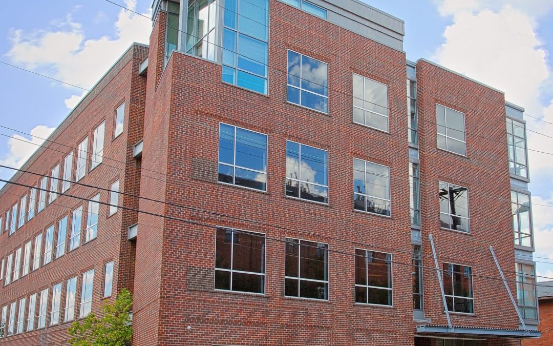 New building with Big Brothers Big Sisers and Godman Guild